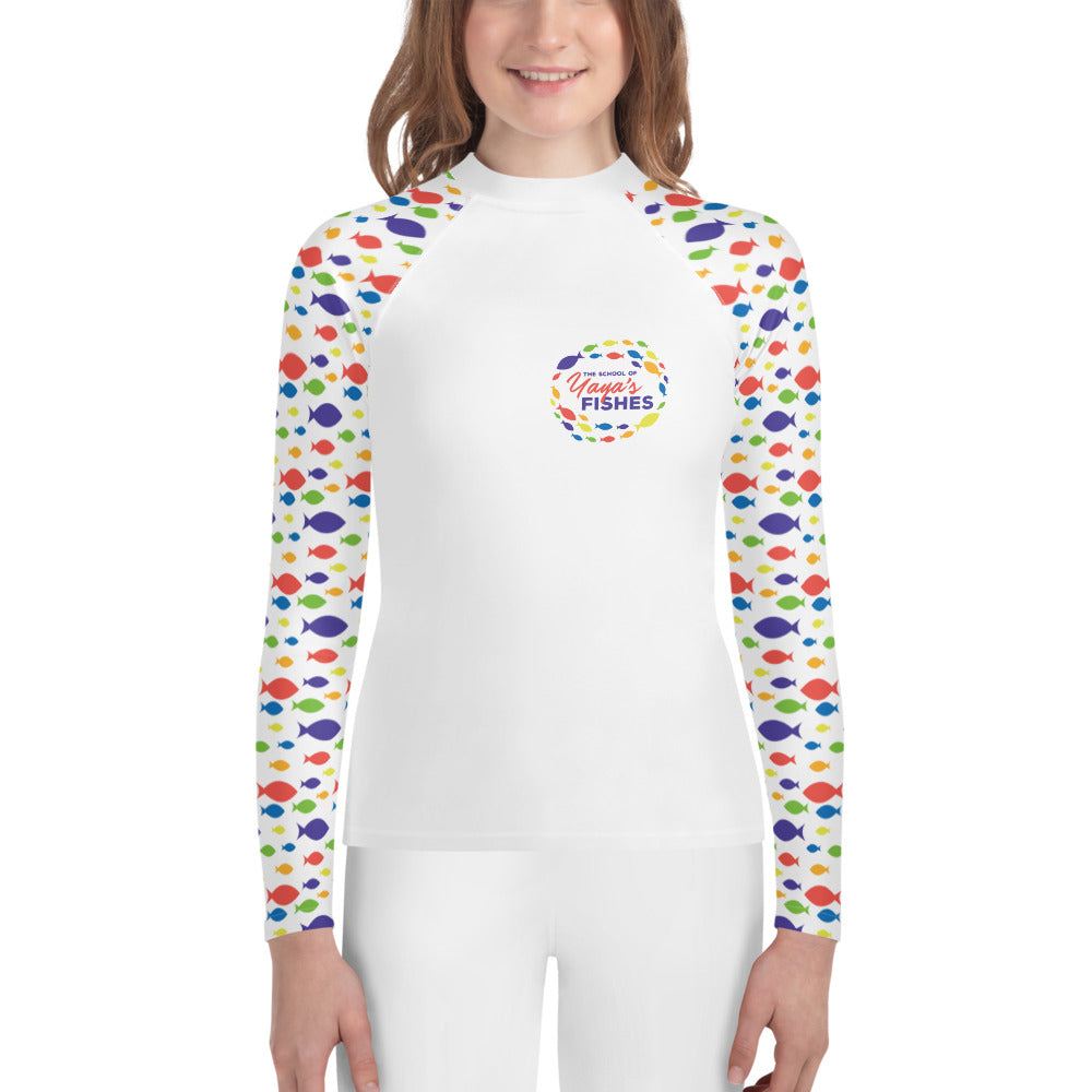Description: Raglan rashguard in white with The School of Yaya’s Fishes logos on front and back and Fish Print on sleeves.