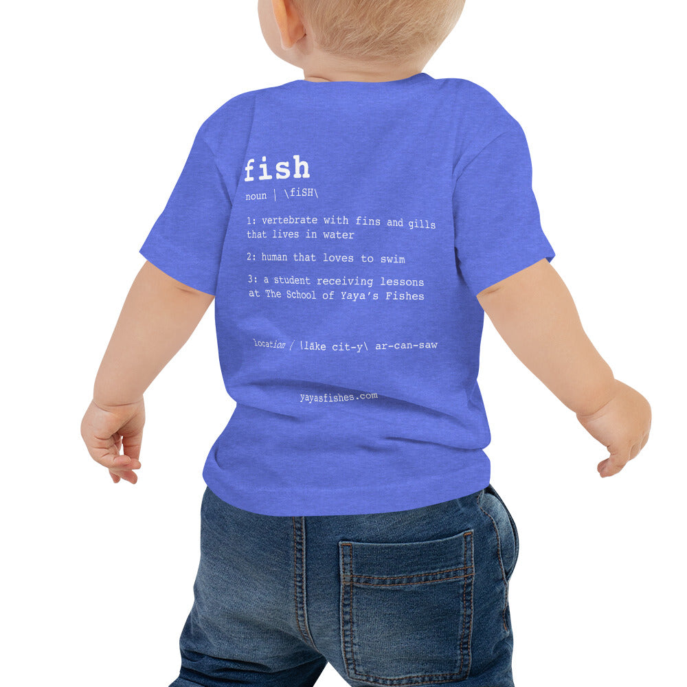Description: Bright Blue Tee shirt with definition on the back in white font. Fish. Noun. 1: Vertebrate with fins and gills that lives in the water. 2: human that loves to swim. 3: a student receiving lessons at The School of Yaya’s Fishes. Location: Lake City, Arkansas written in phonetics. Yayasfishes.com.
