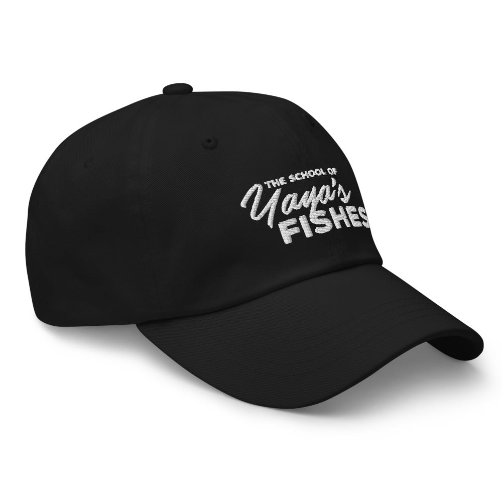 Description: Classic Dad Ball Cap in black with white embroidered logo for The School of Yaya’s Fishes.