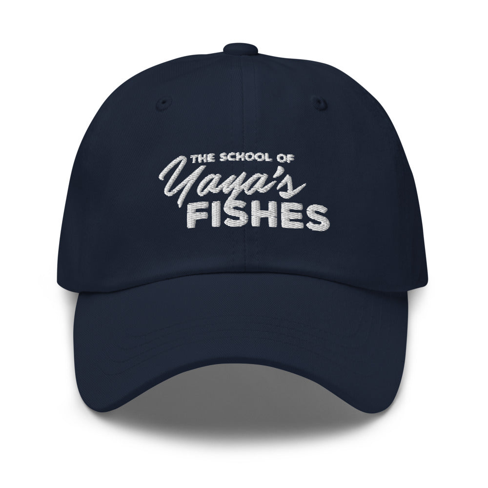 Description: Classic Dad Ball Cap in navy with white embroidered logo for The School of Yaya’s Fishes.